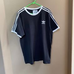 This Men’s Adidas Shirt Is In Excellent Condition. Never Worn Once, Dry Cleaned After. Size Xl. Graphic T Shirts Men, Adidas Three Stripes Crew Neck T-shirt, Basic Crew Neck T-shirt With Three Stripes, Black Crew Neck T-shirt With Three Stripes, Black Three Stripes Crew Neck T-shirt, Casual Black T-shirt With Three Stripes, Cotton T-shirt With Three Stripes, Casual Cotton Adidas T-shirt, Adidas Cotton T-shirt With Crew Neck