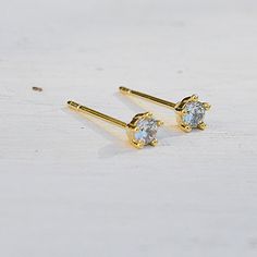 gold earrings Minimalist Birthstone Earrings In Cubic Zirconia, Minimalist Birthstone Earrings With Cubic Zirconia, Minimalist Diamond Earrings With Prong Setting As Gift, Dainty Diamond Earrings With Prong Setting As Gift, Dainty Prong-set Earrings As Gift, Dainty Prong Set Earrings As Gift, Delicate Diamond Earrings With Single Diamond For Gift, Delicate Single Diamond Earrings As A Gift, Dainty Diamond Earrings With Prong Setting