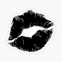 a black and white sticker with the shape of a kiss on it's lips