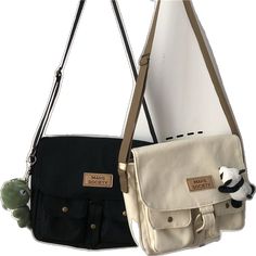 Trendy Rectangular Student Canvas Bag, Trendy Rectangular Canvas Bag For Students, Casual Student Crossbody Canvas Bag, Casual Crossbody Canvas Bag For Students, Student Rectangular Shoulder Bag With Pockets, Rectangular Shoulder Bag With Pockets For Students, Trendy Rectangular Student Bags, School Satchel With Large Capacity, Casual Shoulder Bag For Students