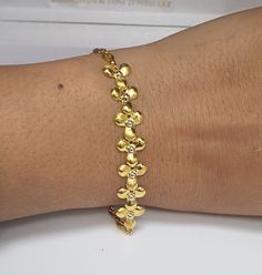 22K Yellow Solid Gold Ladies Fancy Bi Colour Flower Bracelet  Metal :22K Gold 916   Gold Weight -4.5 Grams  Bracelet Length - 7.5'' Inches  Packaging : Elegant Box  Shipping Free in UK Shipping World Wide : See Policy Payment : PayPal, Credit Card, Bank Transfer Returns Policy : 14 Days Hassle Free Returns for 100% Refund   To try this item Or View More from our collections  Please Visit Our North West London Showroom Gold Flower Shaped Bracelets For Formal Occasions, Elegant Yellow Flower Bracelets, Elegant Yellow Flower Bracelet, Gold Flower Shaped Bracelet For Weddings, Mangalsutra Bracelet, Om Pendant, Gents Ring, Bracelet Metal, West London