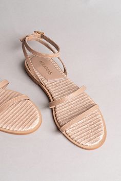 Synthetic upper, insole Polyurethane sole Buckle styling Imported | Tonga Double Band Sandals by Kaanas in Pink, Women's, Size: 11, Polyurethane at Anthropologie Natural Sandals With Flat Heel And Removable Insole, Natural Sandals With Removable Insole And Flat Heel, Beige Flat Sandals With Heel Strap, Natural Color Flat Sandals With Cushioned Footbed, Natural Flat Sandals With Cushioned Footbed, Open Toe Flats With Leather Sole, Flat Natural Sandals With Textured Sole, Natural Flat Sandals With Textured Sole, Beige Open Toe Flats With Removable Insole