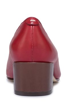 A delicate bow and glossy cap toe add timeless appeal to a poised leather pump set on a cushioned footbed and wrapped block heel. 1 3/4" heel Cushioned footbed Leather upper, lining and sole Made in Brazil Low Heel Dress Shoes For Women, Classic Heels With Red Sole And Medium Width, Heels With Red Sole For Work, Classic Heels With Red Sole For Work, Classic Low Heel Court Shoes With Red Sole, Classic Court Shoes With Red Sole And Low Heel, Classic Court Shoes With Red Sole For Work, Red Low Heel Block Heels For Formal Occasions, Classic Red Court Shoes For Work