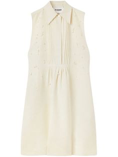 beige hemp classic collar pleated plastron embroidered pearls sleeveless straight hem This item contains at least 50% materials which are certified or widely recognised as having a lower environmental impact through production and/or manufacturing processes that reduce water consumption and the use of harmful chemicals, or re-use by-products of the production process. Luxury Cream Dress For Summer, Chic Sleeveless Dresses With Pearl Embroidery, Elegant Daywear Dresses With Collar, Spring Sleeveless Dress With Pearl Embroidery, Spring Silk Dress With Pearl Embroidery, Chic Spring Dresses With Pearl Embroidery, Silk Dress With Pearl Embroidery For Spring, Chic Dresses With Pearl Embroidery For Spring, Chic Cream Embellished Dress