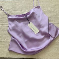 Dance And Marvel Cowl Neck Crop Satin Silk Cami. Size Medium. Color: Lavender Purple. So Cute! Flowy Top, Soft Material. Camisole With Cowl Neckline And Adjustable Straps. Fit Is Loose And Drapey. New With Tags. Never Worn. Still Has Tags. Elegant Purple Camisole For Summer, Purple Summer Party Camisole, Summer Party Purple Camisole, Elegant Purple Summer Camisole, Spring Party Purple Camisole, Chic Fitted Purple Camisole, Surprise Dance Outfits, Surprise Dance, Purple Outfit