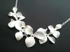 #jewelry #necklaces #beadednecklaces #orchidnecklace #flowernecklace #bridesmaidgifts #weddingjewelry #flowergirl #weddingnecklace #orchidearrings #rosegoldearrings #mothernecklace #sisternecklace #christmasgift #jewelry #necklace Silver Flower Necklace For Wedding, Elegant Silver Flower Decoration Necklace, Flower-shaped Necklace With Flower Decoration For Wedding, Elegant Silver Flower Necklace With Decoration, Flower Shaped Necklace With Flower Decoration For Wedding, Silver Flower Bridal Necklace For Wedding, Wedding Flower Necklace With Flower Charm, Wedding Necklaces For Mother's Day With Flower Pendant, Mother's Day Wedding Necklace With Flower Pendant