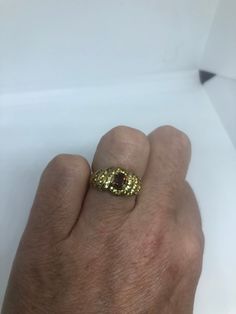 Golden Topaz and garnet gold finished 925 Sterling Filigree Setting Handmade Size 6.5 can be resized, my jeweler charges $10-$20 All rings are shipped free in the US in a nice gift box. Check out our over a THOUSAND great reviews Engraving is $4 per letter and is not always perfect depending on the piece. It can take a few days if the jeweler is busy. This is payable to Paypal Judithsltd@gmail.com Heirloom Style Gold Sapphire Ring With Accent Stones, Gold Heirloom Sapphire Ring With Accent Stones, Heirloom Gold Sapphire Ring With Accent Stones, Heirloom Gold Topaz Ring With Accent Stones, Vintage Gold Sapphire Ring Gift, Gold Ruby Ring With Accent Stones As Gift, Gold Birthstone Ring With Accent Stones For Formal Events, Gold Birthstone Ring With Accent Stones For Formal Occasions, Formal Gold Birthstone Ring With Accent Stones