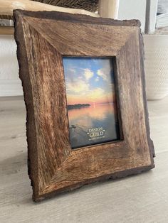 a wooden frame sitting on top of a table