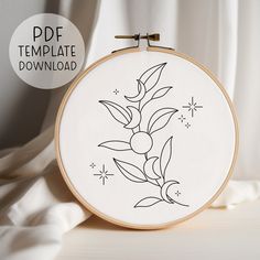 the embroidery pattern is ready to be made into a wall hanging or table top decoration