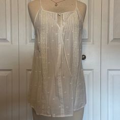 Nwot. Purchased But Never Worn. Very Dainty And Delicate Looking. Boho Look. Color Is Listed As White But This Is More Off White/ Ecru Color Cream Tank Top For Summer Daywear, Cream Sleeveless Daytime Top, Cream Sleeveless Top For Daytime, Cream Cami Tank Top For Beach, Cream Cami Tank Top For The Beach, Cream Camisole For Spring Daywear, Spring Cream Camisole For Daywear, Casual Cream Camisole For The Beach, Cotton Cami Tank Top For Daytime