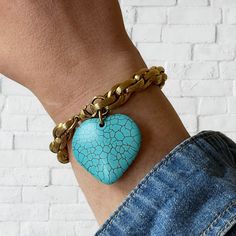 "Turquoise Heart Charm Bracelet This bold bracelet is just the thing your jewelry collection needs. Featuring a turquoise heart this chain bracelet will pull together every look. Not only will this gold bracelet look good on its own, but will make your outlook unforgettable. ★ Complete the look ★ Matching Necklace Available to Purchase Here: https://yourockjewels.etsy.com/listing/1649027172/turquoise-heart-necklace-large-heart ---------------------------------------- M A T E R I A L S * 18K gold Gift Turquoise Metal Bracelets, Turquoise Metal Charm Bracelet As Gift, Turquoise Metal Charm Bracelet Gift, Trendy Turquoise Metal Bracelets, Turquoise Bracelet With Heart Charm For Gifts, Turquoise Bracelets With Heart Charm As Gift, Turquoise Bracelet With Heart Charm As Gift, Turquoise Heart Charm Bracelet Gift, Turquoise Heart Bracelet As A Gift