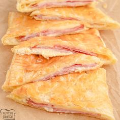 ham and cheese pastries stacked on top of each other