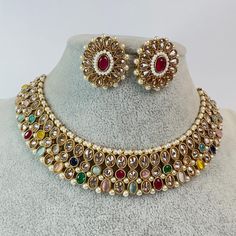 Multi Antique Polki Kundan necklace set/Reverse Ad Necklace/Statement necklace/Indian/Punjabi Necklace/Pakistani Jewelry/Bridal necklace/ Regular Size And Adjustable Stone Necklace Antique Necklace Set with dull gold finish This is 100% Handmade jewelry. So Color, shades, texture displayed may slightly vary from the actual product due to digital image limitations. We request you to consider these minor variations. Please expect the possibility of some slight imperfections when buying hand made j Round Bollywood Necklace For Eid, Multicolor Ceremonial Jewelry For Navratri, Bollywood Style Round Necklace For Eid, Multicolor Kundan Necklace For Ceremonial Festivals, Multicolor Kundan Necklace For Ceremonial Occasions And Diwali, Multicolor Kundan Necklace For Ceremonial Occasions During Diwali, Bollywood Style Multicolor Round Jewelry Sets, Bollywood Style Multicolor Jewelry Sets For Ceremonial Occasions, Bollywood Multicolor Jewelry For Ceremonial Occasions