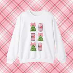 Coquette Diet Coke Christmas Sweatshirt Cozy Up in Pink Coquette: Diet Soda Christmas Sweatshirt ✨🍭 Celebrate the season with a touch of whimsical charm! Our Pink Coquette Diet Soda Christmas Sweatshirt is the perfect blend of festive fun and vintage-inspired style. Made for those who love a playful twist on holiday fashion, this sweatshirt will make you stand out at any gathering, from cozy nights by the fire to cheerful Christmas parties. Features: 🎄 Festive Design: Featuring a delightful pink coquette theme with a cheeky diet soda graphic, this sweatshirt adds a unique, retro flair to your holiday wardrobe. 🍬 High-Quality Fabric: Made from a soft, cozy blend of cotton and polyester, it offers unbeatable comfort while keeping you warm on chilly winter days. 👚 Flattering Fit: With a r Cute White Christmas Sweater, Cute Sweatshirt For Holiday Winter, Cute Winter Holiday Sweatshirt, Cute White Christmas Sweatshirt, Coquette Diet, Coke Christmas, Holiday Party Attire, Christmas Party Fashion, Christmas Wear