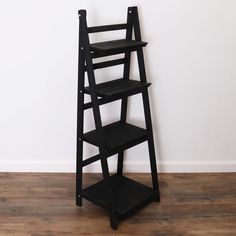 PRICES MAY VARY. MILLTOWN MERCHANTS LADDER BOOKSHELF - The Milltown Merchants black bookshelf comes with a unique rustic finish paired with a clean, modern silhouette. The carefully curated display is great for showcasing photo frames, succulents, art, small house plants, wicker baskets, and books. Create an eye catching display to compliment your unique space with the Milltown Merchants wooden bookshelf! EASY SETUP / NO TOOLS REQUIRED - The Milltown Merchants leaning bookcase takes just seconds Black Ladder Shelf, Brown Bookshelf, Succulents Art, Leaning Bookshelf, Farmhouse Bookshelf, Traditional Bookcases, Wooden Ladder Shelf, Rustic Bookshelf, Small House Plants