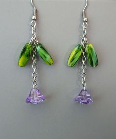 Green Earrings For Spring, Spring Purple Flower Earrings For Pierced Ears, Trendy Green Dangle Flower Earrings, Trendy Green Flower Earrings, Trendy Purple Earrings For Spring, Green Dangle Flower Earrings For Spring, Spring Green Dangle Earrings, Green Dangle Earrings For Spring, Purple Earrings For Spring