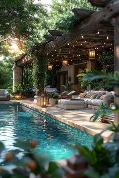 an outdoor living area with a pool and patio furniture in the foreground, surrounded by greenery