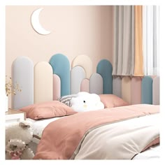 there is a teddy bear sitting on the bed in this pink and blue bedroom with pastel colors