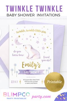 a baby shower party with purple and gold foil on the envelope, it has an image of a polar bear