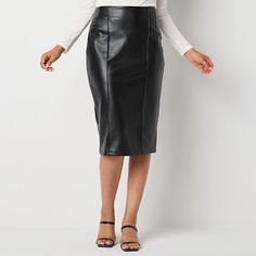 Add a bit of edge to your sleek look with this women's faux leather pencil skirt from Bold Elements. Cut to a high-rise it has a comfortable elastic waistband with a back slit and a midi length. Versatile for many looks, pair it with a satin blouse and stilettos.Front Style: Flat FrontClosure Type: Full ElasticClosure Location: FrontRise: High RiseApparel Length: 28.5 InchesFiber Content: 95% Polyester, 5% SpandexFabric Description: Faux LeatherLining: UnlinedSkirt Length: Midi LengthCare: Tumbl Faux Leather Pencil Skirt, Midi Pencil Skirt, Womens Pencil Skirts, Leather Pencil Skirt, Pencil Skirt Black, Midi Skirt Pencil, Pencil Skirts, Satin Blouse, Sleek Look