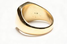 Tiffany & Co. Gold Men's Ring.Upgrade your style with this vintage Tiffany & Co. gold signet men's ring. Make a statement and exude confidence with this classic piece of jewelry. This is a men's signet ring made by Tiffany & Co. It is made of 14k yellow gold and has a wide band. The ring does not feature a main stone and is suitable for everyday wear. Ring is currently size 12.5. It can be resized upon request. Classic Hallmarked Signet Ring For Collectors, Classic Hallmarked Signet Ring Collectible, Classic Formal Dome Ring With Polished Edges, Antique Signet Ring With Polished Finish For Formal Occasions, Vintage Round Signet Ring For Formal Occasions, Classic Rectangular Signet Ring Collectible, Classic Formal Signet Ring, Antique Dome Ring With Polished Finish For Formal Occasions, Antique Dome Ring With Polished Finish For Formal Events