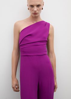 Asymmetrical jumpsuit with draped detail - Woman | MANGO USA Spring Evening Jumpsuits With Asymmetrical Neckline, Spring Evening Jumpsuit With Asymmetrical Neckline, Spring Jumpsuits With Asymmetrical Neckline, Spring Jumpsuits And Rompers With Asymmetrical Neckline, Chic Asymmetrical Evening Jumpsuits And Rompers, Chic Asymmetrical Jumpsuits And Rompers For Evening, Chic Evening Asymmetrical Jumpsuits And Rompers, Elegant Asymmetrical Jumpsuits And Rompers For Work, Chic Formal Jumpsuits With Asymmetrical Neckline