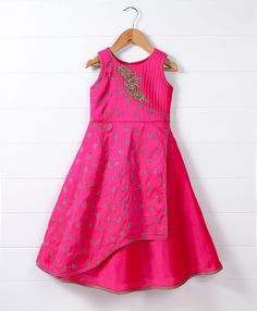 Let your little girl be ready for the next special occasion with this sleeveless ethnic gown. Made from soft fabric, this outfit features floral embroidery. Round neck ensures easy and fuss free dressing. SIZING TIP : * Please review the size chart for each outfit before making your size selection. more specifically look at the chest and length * If your child currently wears different sizes for top and bottom, please go with the smaller size of the two while picking the outfit FABRIC: Synthetic WHAT'S INCLUDED: One Piece Dress CARE: Dry Clean Only Sleeveless Anarkali Kurta For Parties, Sleeveless Pink Choli For Festive Occasions, Summer Anarkali Set With Pallu For Party, Festive Anarkali Sleeveless Dresses, Pink Sleeveless Lehenga For Navratri, Traditional Sleeveless Navratri Dresses, Sleeveless Anarkali Dresses For Festive Occasions, Festive Sleeveless Anarkali Dresses, Sleeveless Dori Work Wedding Dress