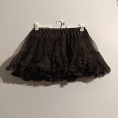 Black Layered Elastic Leg Avenue Waistline Shear Petticoat, One Size 90 To 160 Pounds. Measures 23" Waistline Flat Unstretched, From Waistline To Bottom 15" New In Pack Never Worn. Bin#82 Black Costume Skirt With Attached Cancan, Black Skirt With Attached Cancan For Costume, Fitted Black Petticoat With Ruffles, Vintage Black Skirted Bottoms, Black Stretch Petticoat For Spring, Black Stretch Skirt With Lace Trim, Black Spring Petticoat, Black Petticoat For Costume Party In Spring, Black Petticoat For Spring Costume Party