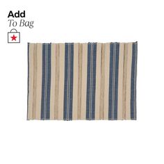 a blue and white striped rug with the words add to bag on it's side