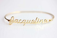 Jacqueline Name Bracelet, Name Bracelet Gold, Jacqueline Name Jewelry, Name Plate Jewelry Gold Vintage Gold Personalized Bracelets, Vintage Personalized Gold Charm Bracelet, Personalized Vintage Gold Bracelets, Personalized Vintage Gold Charm Bracelet, Retro Gold Cuff Bracelet As A Gift, Vintage Personalized Adjustable Bracelets, Retro Bangle Bracelets For Gifts, Retro Bangle Bracelets For Gift, Retro Gold Bangle As A Gift