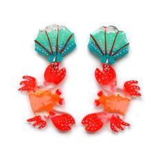 Laser cut crab earrings featuring a unique hand painted pattern of shades of red, pink, peach and pink resin with tiny hand painted light pink details. The crabs dangle from blue with red and pink detailed sea shells.- Painted pattern is over clear, see through, acrylic. This effect gives the earrings a fun layered depth.- Earrings are 2.5 inches long by 1 inches wide. - Earrings are push back studs in hypoallergenic stainless steel. - Lightweight, not heavy at all. Great for daily wear.- Earrin Toothpaste Kisses, Beach Beads, Crab Earrings, Hand Painted Pattern, Red Crab, Pink Details, Mixed Media Jewelry, Pinterest Ideas, Acrylic Jewellery