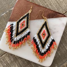 Beautifully Beaded Tassel Earrings. Gold, Black, Coral And White Pattern. 4” Drop Style: Boho Bohemian Tribal Anthropologie Free People Hippie Ethnic Stitchfix Fashion Sparkle Handmade Beaded Gold Statement Bundle Discounts. Many Styles And Colors To Choose From. 500+ Chili Mango, Pearl Logo, Marble Earrings, Knot Stud Earrings, Black Coral, Initial Earrings, Beaded Tassel Earrings, Jeweled Earrings, Big Hoop Earrings