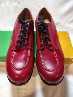 Never worn, new deadstock, vintage women's lace-up oxfords in deep red/mahogany color.  Size women's 9.5C...fits like a modern 9.5 narrow to medium.  These are beautifully made shoes with excellent craftsmanship.  Leather is heavy and will last forever...may take some breaking in.  Will come with box, although not sure if it is original to the shoe. Vintage Low-top Lace-up Shoes With Leather Sole, Burgundy Oxfords With Rubber Sole And Plain Toe, Red Goodyear Welted Lace-up Oxfords, Goodyear Welted Burgundy Oxfords With Plain Toe, Vintage Lace-up Shoes For Derby With Round Toe, Vintage Lace-up Shoes With Almond Toe For Derby, Vintage Almond Toe Lace-up Shoes For Derby, Vintage Lace-up Derby Shoes With Round Toe, Vintage Lace-up Oxfords For Derby