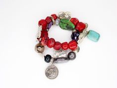 This vintage bracelet is a true gem, featuring chunky stones and an Alexander the Great coin. The red jasper and turquoise beads add a pop of color to any outfit, making it a perfect accessory for any occasion. You will receive: (What you see in the images) - 1 Chunky Stone Bracelet: Size 6" (This is stretchable so it can get much bigger) Contact me through Etsy messaging with any questions. All vintage items are hand picked for quality and uniqueness, so you can feel special wearing an authentic piece of the past. Thanks for shopping at Rose & Lily's, check back often for new vintage treasures. Adjustable Eclectic Red Jewelry, Red Gemstone Beaded Bracelet Bohemian Style, Red Bohemian Bracelet With Natural Stones, Bohemian Red Bracelet With Natural Stones, Red Bohemian Beaded Gemstone Bracelet, Rose Lily, Coin Bracelet, Alexander The Great, Vintage Bracelet