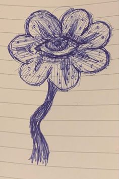 a drawing of a flower on lined paper