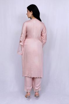 Pastel pink kurta with floral cutwork and sheer sleeve hem detailing. Paired with tonal pant and kota dupatta.
Component: 3
Type Of Work: Floral
Neckline: Round
Sleeve Type: Full sleeves
Fabric: Modal Satin, Kota, Organza
Color: Pink
Other Details: 
Sheer sleeve hem
Nalki work or neckline
Scallop hem on kurta
Occasion: Puja - Aza Fashions Feminine Resham Embroidery Sets For Festive Occasions, Party Salwar Kameez With Lace Work, Elegant Saree Set For Spring, Pink Kurta With Sheer Dupatta For Spring, Pink Long Sleeve Salwar Kameez With Lace Work, Spring Pink Kurta With Sheer Dupatta, Festive Feminine Chikankari Embroidery Sets, Feminine Festive Sets With Chikankari Embroidery, Festive Feminine Sets With Chikankari Embroidery