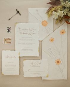 the wedding stationery is laid out and ready to be used