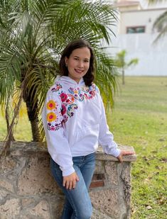 This beautiful sweatshirt is hand embroidered by Mexican artisans. It's great for keeping you warm in cold weather. It has a beautiful multi-colored floral embroidery. Sweatshirt has a kangaroo pouch on the front. We ship anywhere in the word, from Tepic, Nayarit, mx. Made by artisans from Oaxaca, mx Hooded Hoodie With Floral Embroidery For Spring, Casual Hooded Hoodie With Floral Embroidery, Embroidered Hooded Hoodie For Spring, Spring Embroidered Hooded Hoodie, White Hoodie With Embroidered Graphics For Fall, White Long Sleeve Hoodie With Embroidered Graphics, Embroidered Hooded Sweatshirt For Spring, Hooded Embroidered Sweatshirt For Spring, Spring Embroidered White Hoodie