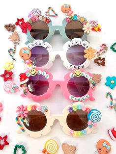 "CHRISTMAS SUNNIES!! These are so adorable-- Each pair is handcrafted by me. Using various beads, Charms, Rhinestones, and fun details! ♥️💚 *4 options available-- Choose your style: 1. CHRISTMAS BAKING CREW 2. SANTAS HELPER 3. LIL SUGAR PLUM 4. HOLLY JOLLY VIBES * Anti-Glare * UV Protection (UVA & UVB) * Durable and shatterproof * They open and close smoothly * Each item is made to order and will be ready to ship in 5-7 business days! If you need your order sooner. Please check out my \"RUSH OR Diy Sunnies, Christmas Sunglasses, Sunny Meadow, Holly Jolly Vibes, Diy Sunglasses, Diy Projects To Make And Sell, Beaded Sunglasses, Christmas Toddler, Sleepover Birthday Parties