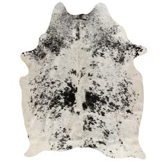 a black and white cowhide rug on a white background