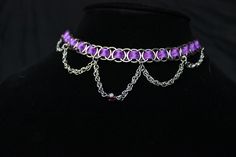 chainmail ribbon necklace with delicate chain loops as decoration with a purple crystal Purple Metal Choker For Gift, Handmade Silver Dangle Choker, Handmade Stainless Steel Choker, Hypoallergenic Metal Jewelry For Gifts, Handmade Metal Dangle Choker, Adjustable Metal Choker, Adjustable Silver Stainless Steel Choker, Handmade Stainless Steel Round Pendant Jewelry, Adjustable Stainless Steel Silver Choker