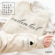 Custom Text Sweatshirt, Personalized Text Gift, Cute Sweatshirt,Custom Appreciation Gift, Personalized Gift,Keepsake Shirt,Customizable Gift Our graphic sweatshirts are very soft, very cute and bound to keep you warm in the colder months. It's a pre-shrunk, classic fit sweater made with air-jet spun yarn for a soft feel.  ► SHIRT DETAILS The Gildan sweatshirts are UNISEX - they are meant to have a relaxed fit, please refer to the size chart for more details. * 8.0 oz., 50/50 cotton/polyester * Pre-shrunk * Classic fit * Reduced pilling and softer air-jet spun yarn * 1x1 athletic rib knit collar, cuffs and waistband, with spandex * Double-needle stitched collar, shoulders, armholes, cuffs and waistband *If you are looking for a different fit, tank top, sweatshirt or kids shirt, please conta Custom Text Long Sleeve Tops For Gifts, Text Gift, Nice People, Customizable Gifts, Image Fun, Fun Sweatshirts, Greenville Sc, Gildan Sweatshirts, Cute Sweatshirts