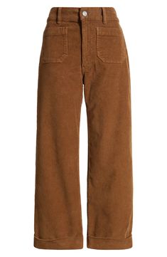 Patch pockets and wide legs add '70s-inspired style to high-waist pants made from soft, comfortable corduroy. 33" inseam; 20 1/2" leg opening; 11 1/4" front rise Zip fly with button closure Front patch pockets 97% cotton, 3% elastane Machine wash, dry flat Made in Turkey Corduroy Pants 70s, 1970s Pants, Brown Carpenter Pants, Corduroy Wide Leg Pants, Carpenter Pants, 70s Inspired, Wide Legs, Fabric Gifts, Free Fabric