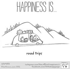 a car driving down a road with the words happiness is