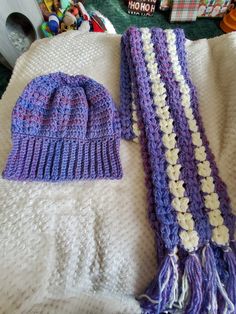 This is a crochet hat and scarf set in purple and white. All of my items are from my smoke free home made with love just waiting to be worn by that special person. If you have any questions please message me. Happy shopping Purple Yarn Crochet Hat, Warm Purple Crochet Yarn Hat, Warm Purple Crochet Hat, Purple Warm Crochet Hat One Size, One Size Purple Warm Crochet Hat, Warm Purple Crochet Hat One Size, Crochet Hat And Scarf Set, Crochet Hat And Scarf, Hat And Scarf Set