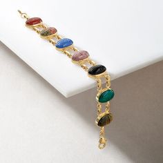 Ross-Simons - Multi-Stone Scarab Bracelet in 14kt Yellow Gold. 7". Ancient symbols enter the modern age with a fashionable approach! 14x10mm scarab cabochons of carnelian, blue chalcedony, green chalcedony and black onyx, unakite, tiger's eye and pink rhodonite decorate double links of 14kt yellow gold. Lobster clasp, multi-stone scarab bracelet. Luxury Oval Bracelet With Natural Stones, Luxury Oval Bracelets With Natural Stones, Scarab Bracelet, Pink Rhodonite, Green Chalcedony, Ancient Symbols, Blue Chalcedony, Tiger's Eye, Multi Stone