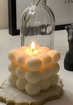 a candle that is sitting on a table