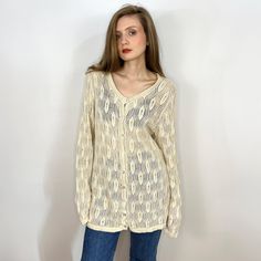 - Vintage cream white cotton cardigan - Very good condition - 100% cotton - Mother of pearl buttons - Tag size XXL, fits many, please see measurements Measurements (laying flat): Shoulders: 44 cm / 17.3 inches Armpit to armpit: 48 cm / 18.9 inches Sleeve: 73 cm / 28.7 inches Length: 80 cm / 31.5 inches SHIPPING INFO: Shipping price in the listing is for the "Standard Latvian post shipping". Includes tracking info and takes: * 5 business days within European Union * 10-15 business days to United Button-up Knitted Cotton Cardigan, Knitted Cotton Button-up Cardigan, Vintage Cotton Cardigan For Summer, Vintage Cotton Summer Cardigan, Classic Lightweight Beige Sweater, Classic Beige Summer Sweater, White Daywear Sweater With Button Closure, Button-up Beige Cotton Cardigan, Open Knit Long Sleeve Cardigan For Daywear