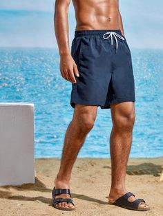 Step up your swimwear game with our Slant Pocket Plain Swim Trunks. Designed specifically with precision, these trunks offer a comfortable fit and masculine style. The slant pockets provide convenient storage for your small essentials, while the high-quality fabric ensures durability and quick-drying capabilities. Features: Style: Boho Pattern Type: Plain Details: Drawstring, Pocket Type: Bottoms Bottom Type: Shorts Fabric: Non-Stretch Care Instructions: Machine wash, do not dry clean Body: Line Short Swim Trunks With Pockets For Beach Season, Nylon Beach Bottoms With Side Pockets, Beach Bottoms With Side Pockets In Nylon, Beachwear Swim Trunks With Side Pockets For Summer, Solid Color Swim Trunks With Side Pockets For Summer, Nylon Swim Trunks With Side Pockets, Short Swim Trunks With Side Pockets For Beach Season, Beachwear Swim Trunks With Side Pockets, Beachwear Swim Trunks With Pockets For Vacation