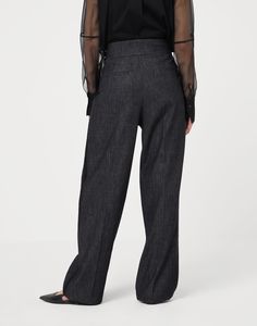 Cotton denim-effect twill loose tuxedo trousers Informal proportions and tailored details come together in perfect harmony in these Loose Tuxedo trousers. The double pleats flow lightly down the entire length of the leg, emphasizing the slender silhouette, while the denim-like fabric gives the garment a casual feel. The button waistband completes the comfortable fit of the trousers. Luxury Denim Straight Leg Bottoms, Luxury Straight Leg Denim Bottoms, Elegant Wide-leg Jeans With Five Pockets, Luxury Fitted Denim Bottoms, Elegant Wide Leg Jeans With Five Pockets, Formal Wide Leg Pants With Hidden Button Closure, Office Straight Leg Bottoms With Hidden Button Closure, Elegant Straight Leg Jeans With Pockets, Classic Wide-leg Denim Bottoms